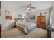 Comfortable bedroom with a king-size bed, side tables, and natural light at 25 Misners Trl, Ormond Beach, FL 32174