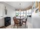 Breakfast nook with a round table and bay window at 25 Misners Trl, Ormond Beach, FL 32174