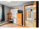 Bedroom featuring light hardwood floors, a closet, and neutral paint at 290 Birch Ave, Orange City, FL 32763