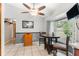 This breakfast nook features a ceiling fan and a large window for abundant natural light at 290 Birch Ave, Orange City, FL 32763