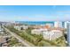 Expansive aerial view of beachfront condos, golf course, and oceanfront cityscape at 3 Oceans West Blvd # 7C6, Daytona Beach, FL 32118