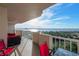 Private balcony with table and chairs features stunning water views at 3 Oceans West Blvd # 7C6, Daytona Beach, FL 32118