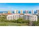 Coastal condo with a stunning view and lush tropical landscaping near a golf course at 3 Oceans West Blvd # 7C6, Daytona Beach, FL 32118