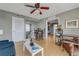 The living room flows into the dining area, offering hardwood floors, neutral walls and water views at 3 Oceans West Blvd # 7C6, Daytona Beach, FL 32118