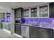 Kitchen boasts stainless steel appliances, elegant countertops, and modern cabinetry for a functional and stylish design at 3 Oceans West Blvd # 7C6, Daytona Beach Shores, FL 32118