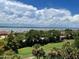 Expansive water view with lush green landscape, showcasing the beautiful surroundings of the property at 3 Oceans West Blvd # 7C6, Daytona Beach Shores, FL 32118