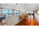 Kitchen island with bar stool seating overlooking beach with blue cabinets at 3000 N Atlantic Ave # 11, Daytona Beach, FL 32118