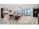 Expansive living room with floor-to-ceiling windows and ocean views at 3000 N Atlantic Ave # 11, Daytona Beach, FL 32118