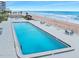 Beautiful pool with a view of the ocean and sandy beach at 3000 N Atlantic Ave # 11, Daytona Beach, FL 32118