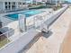 Aerial view of pool complex offering beachfront access and outdoor showers at 3000 N Atlantic Ave # 11, Daytona Beach, FL 32118