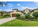 Inviting single-story home featuring lush landscaping, a two-car garage, and a neutral color palette at 3160 Bailey Ann Dr, Ormond Beach, FL 32174