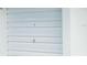 Close-up of a white garage door in a building at 3641 S Atlantic Ave # 212, Daytona Beach Shores, FL 32118