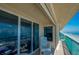 Spacious balcony with seating offers stunning ocean views and a relaxing outdoor space at 4555 S Atlantic Ave # 4708, Port Orange, FL 32127