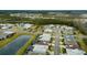 Panoramic aerial view of a meticulously planned community with lush greenery and winding streets at 1068 Sea Shell Ct, Daytona Beach, FL 32124