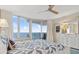 Main bedroom offering ocean views, balcony access, and light-colored furnishings at 1155 Ocean Shore Blvd # 507, Ormond Beach, FL 32176