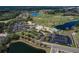 Extensive aerial shot of the golf course, amenities, and surrounding community at 5 Captiva At Lionspaw, Daytona Beach, FL 32124