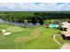 Golf course aerial featuring pond and community pool at 5 Captiva At Lionspaw, Daytona Beach, FL 32124