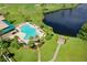 Community clubhouse pool, golf course, and ponds at 5 Captiva At Lionspaw, Daytona Beach, FL 32124