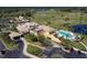 Aerial view of the clubhouse, pool and golf course at 5 Captiva At Lionspaw, Daytona Beach, FL 32124