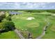 Scenic aerial view of the golf course showcasing the lush green fairways and water features at 5 Captiva At Lionspaw, Daytona Beach, FL 32124