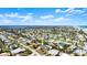 Scenic aerial view of the charming neighborhood and nearby lake, offering the perfect blend of community and waterfront living at 11 Briggs Dr, Ormond Beach, FL 32176