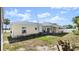 Backyard featuring a covered patio, providing ample outdoor living space at 11 Briggs Dr, Ormond Beach, FL 32176