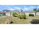 Attractive single-story house with well-kept lawn and rock at 11 Briggs Dr, Ormond Beach, FL 32176