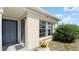 Close up of the house's front door and window at 11 Briggs Dr, Ormond Beach, FL 32176