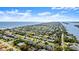 Real estate aerial of a residential area, showing the proximity of the subject property to the beach at 111 Heron Dunes Dr, Ormond Beach, FL 32176
