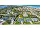Coastal home featuring a private backyard pool, lush landscaping, and close proximity to the beach and river at 111 Heron Dunes Dr, Ormond Beach, FL 32176