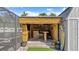 Backyard tiki bar perfect for outdoor entertaining. Surfboards and nautical art are decorating the bar at 111 Heron Dunes Dr, Ormond Beach, FL 32176