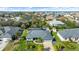 Charming single-Gathering home with a two-car garage, lush landscaping, and a well-manicured lawn in a coastal community at 111 Heron Dunes Dr, Ormond Beach, FL 32176