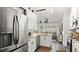 Beautiful kitchen featuring stone countertops, stainless appliances, and an island at 111 Heron Dunes Dr, Ormond Beach, FL 32176