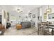 Open-concept living area with modern decor, comfortable seating, and natural light at 111 Heron Dunes Dr, Ormond Beach, FL 32176
