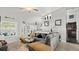 Cozy living room with a comfortable sofa, stylish decor, and plenty of natural light at 111 Heron Dunes Dr, Ormond Beach, FL 32176