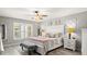 Inviting main bedroom with neutral tones, ample natural light, and stylish furnishings at 111 Heron Dunes Dr, Ormond Beach, FL 32176