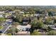 Bird's eye view of a neighborhood highlighting attached garages and tree-lined streets at 128 Pine Cone Trl, Ormond Beach, FL 32174
