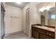 Bathroom featuring a stand up shower, vanity, and closet at 128 Pine Cone Trl, Ormond Beach, FL 32174
