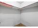 Walk-in closet with wire shelving for ample storage space at 128 Pine Cone Trl, Ormond Beach, FL 32174