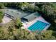 Aerial shot of the community pool, positioned near the tennis courts, offering multiple activity choices at 1432 Kinnard Cir, Ormond Beach, FL 32174