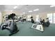 Well-equipped gym with treadmills, weight machines, and stationary bikes, designed for a complete workout at 1432 Kinnard Cir, Ormond Beach, FL 32174