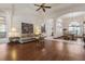 Spacious living room boasting hardwood floors, high ceilings, and an open concept layout at 1432 Kinnard Cir, Ormond Beach, FL 32174