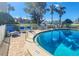 Enjoy the community pool, marked with a 9 ft. depth, perfect for lounging and swimming at 2600 Ocean Shore Blvd # 103, Ormond Beach, FL 32176