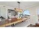 Bright dining area with access to the deck, kitchen and the front entry at 3390 Ocean Shore Blvd # 4020, Ormond Beach, FL 32176