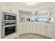 This gourmet kitchen has stainless appliances and overlooks the living area with ocean views at 3390 Ocean Shore Blvd # 4020, Ormond Beach, FL 32176