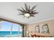 Bright living room featuring an eclectic chandelier and breathtaking ocean views at 3390 Ocean Shore Blvd # 4020, Ormond Beach, FL 32176