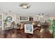 Spacious living room featuring hardwood floors, stylish decor, and a comfortable seating area at 3390 Ocean Shore Blvd # 4020, Ormond Beach, FL 32176