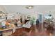 Open floor plan with luxury vinyl floors, a large sectional and views of the ocean at 3390 Ocean Shore Blvd # 4020, Ormond Beach, FL 32176