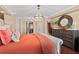 Comfortable main bedroom with soft lighting and a stylish decor at 3390 Ocean Shore Blvd # 4020, Ormond Beach, FL 32176