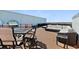 Spacious rooftop deck with multiple seating areas, perfect for entertaining guests at 3390 Ocean Shore Blvd # 4020, Ormond Beach, FL 32176